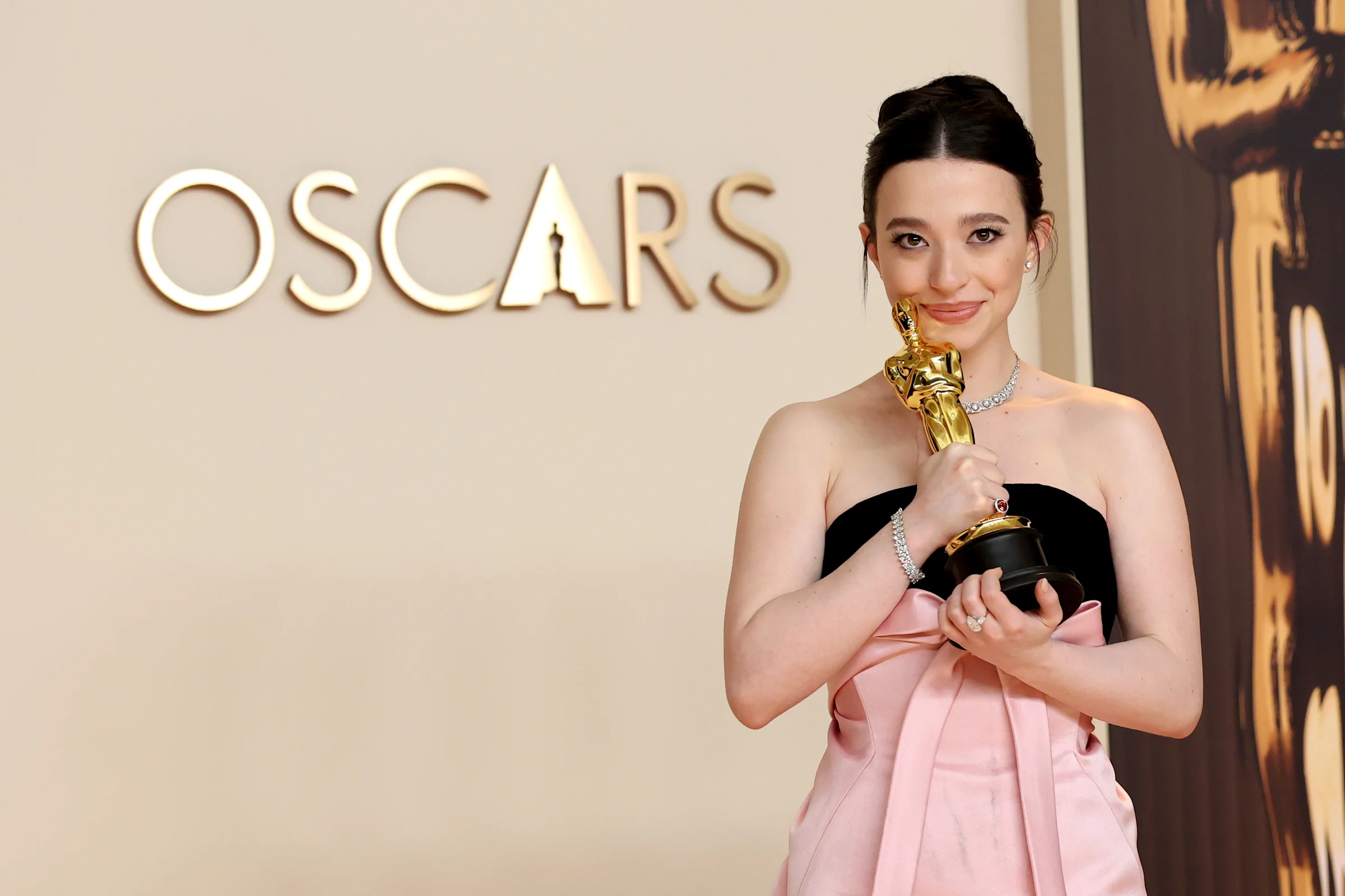 Mikey Madison, poses with her Oscar for Best Actress.
